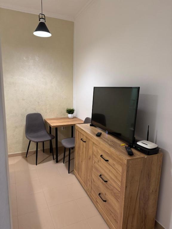 TV o dispositivi per l'intrattenimento presso Apartman Cute&Cosy