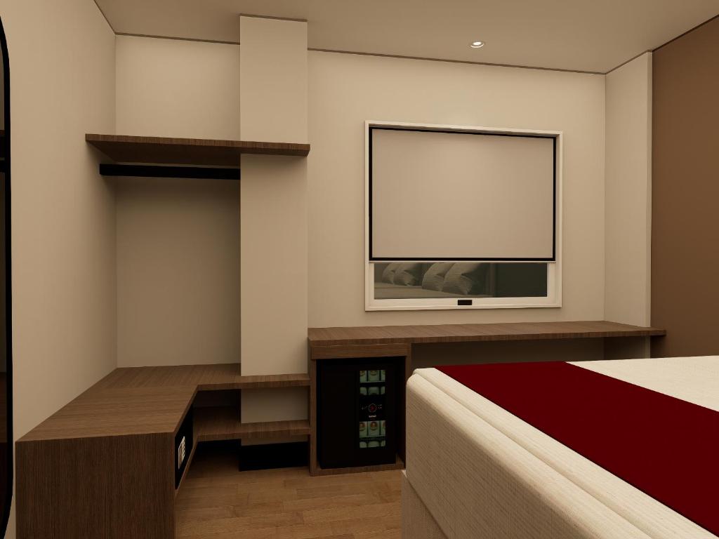 Postel nebo postele na pokoji v ubytování Hotel Continental ByHours