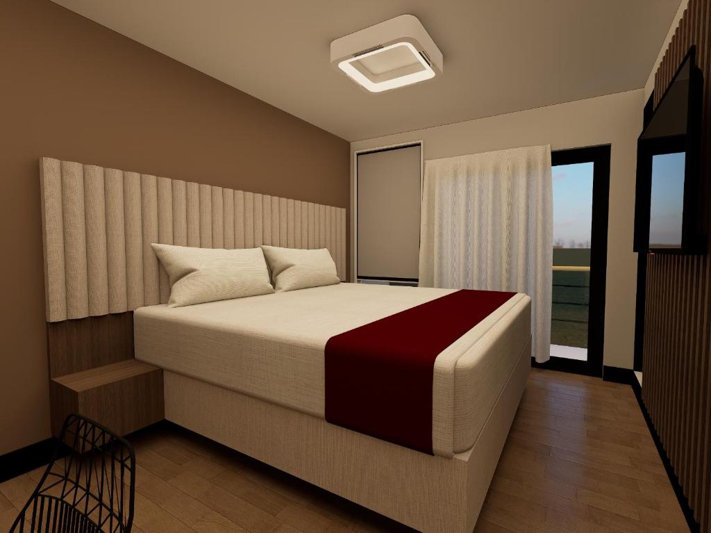 Postel nebo postele na pokoji v ubytování Hotel Continental ByHours