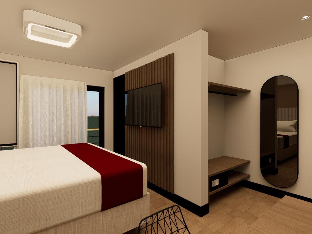 Postel nebo postele na pokoji v ubytování Hotel Continental ByHours