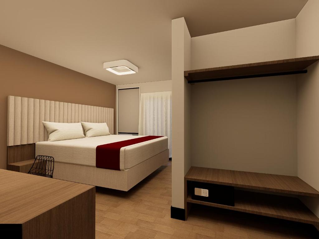 Postel nebo postele na pokoji v ubytování Hotel Continental ByHours