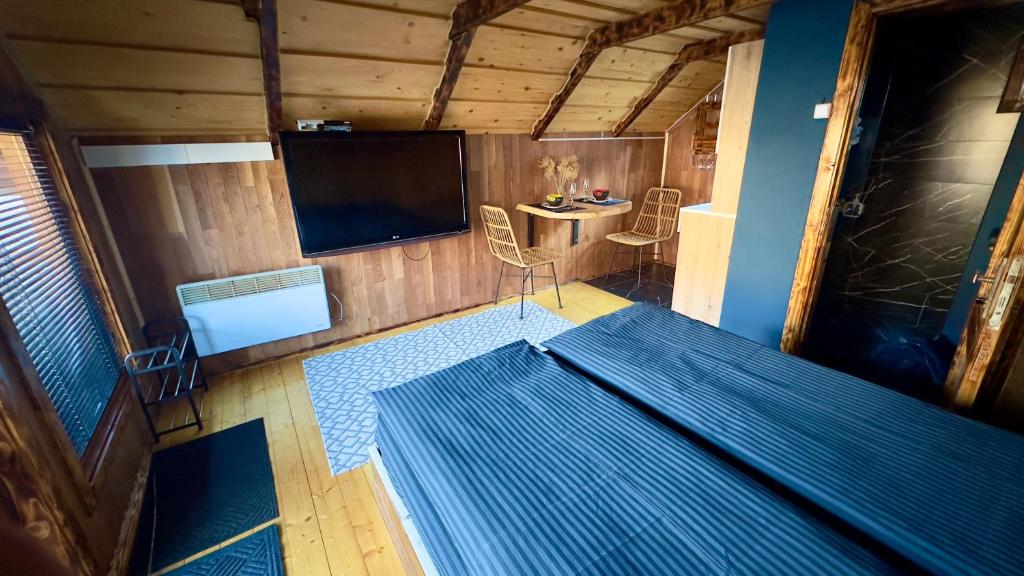 Postel nebo postele na pokoji v ubytování VIP-Domyk
