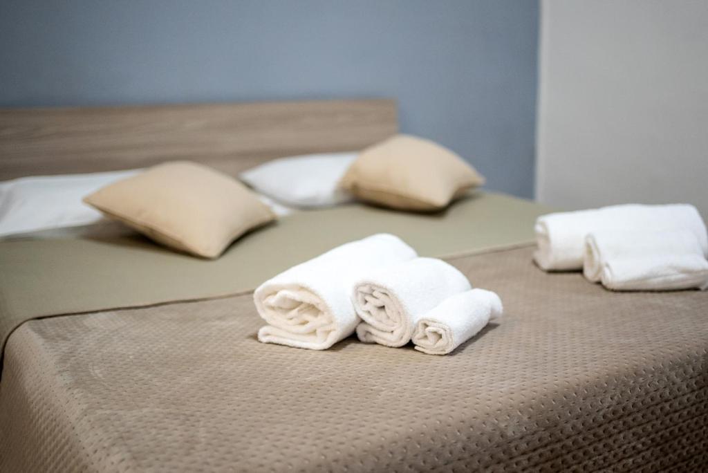 Łóżko lub łóżka w pokoju w obiekcie home Joséphine, a due passi dalla Reggia