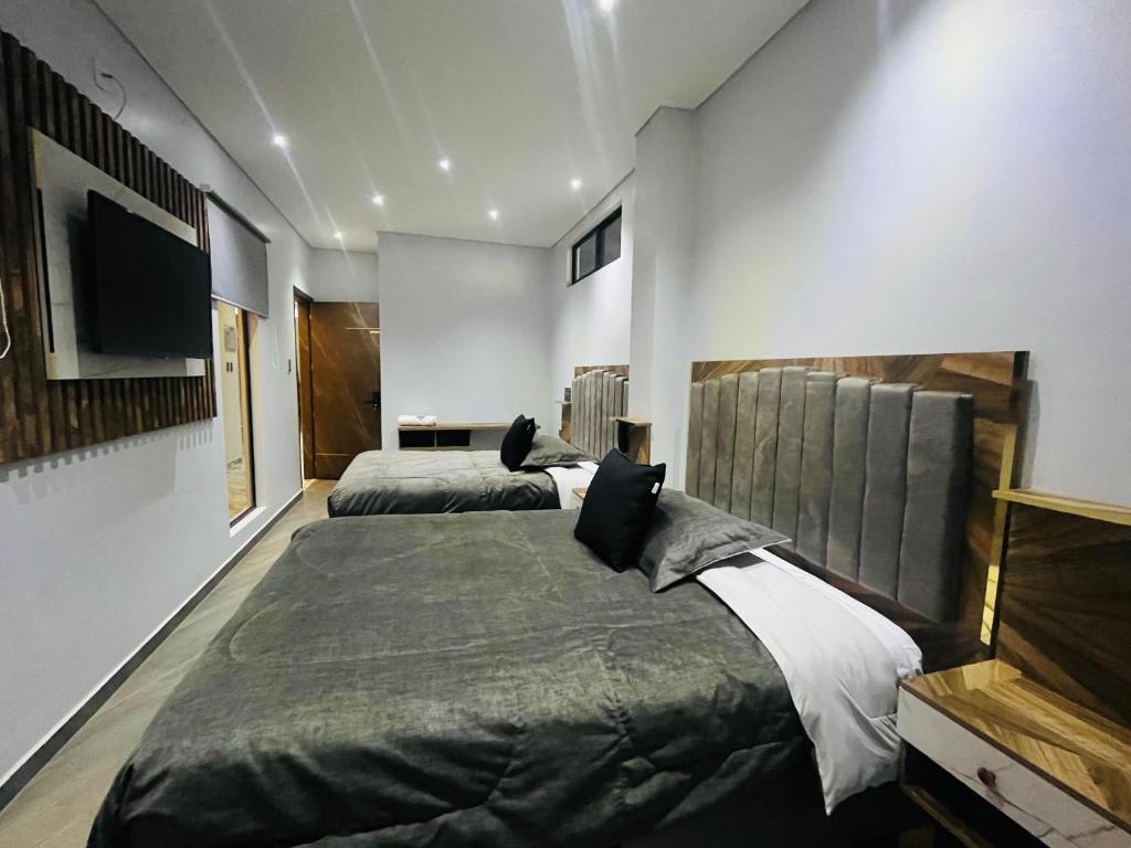 Postel nebo postele na pokoji v ubytování Hotel luxury Z