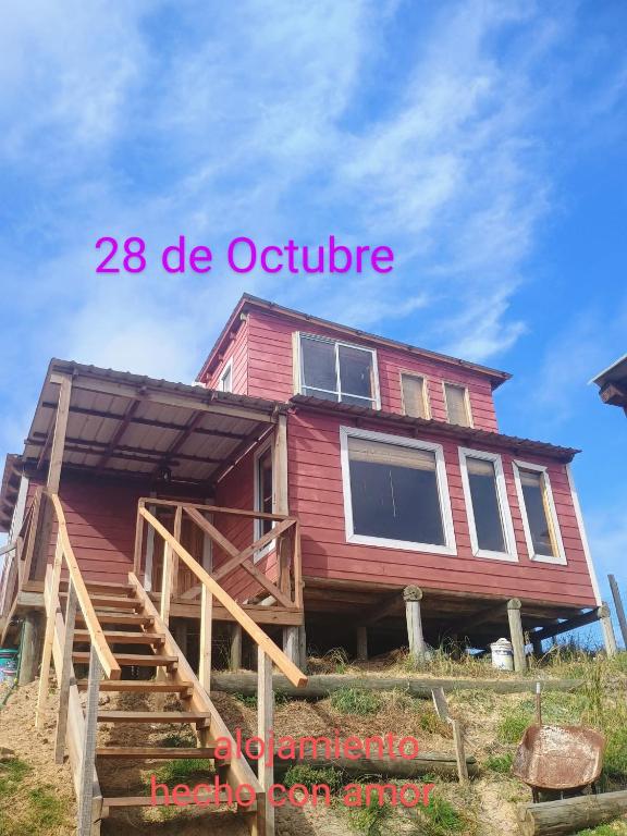 a house is being built on the beach at 28 de Octubre in Punta Del Diablo