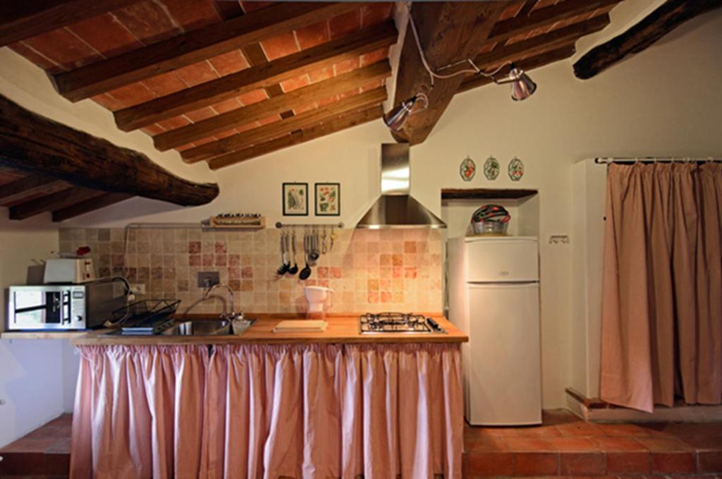 Kuchyň nebo kuchyňský kout v ubytování Al Palazzaccio