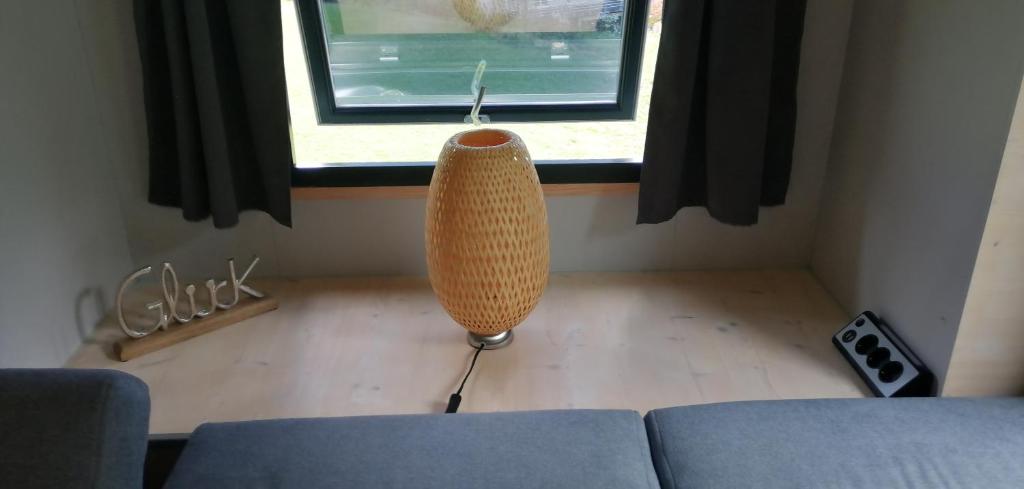 Posezení v ubytování Tiny House im Grünen