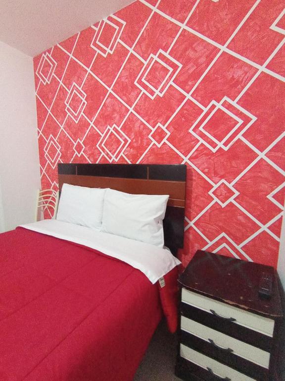 Postel nebo postele na pokoji v ubytování Hotel D'Gloria
