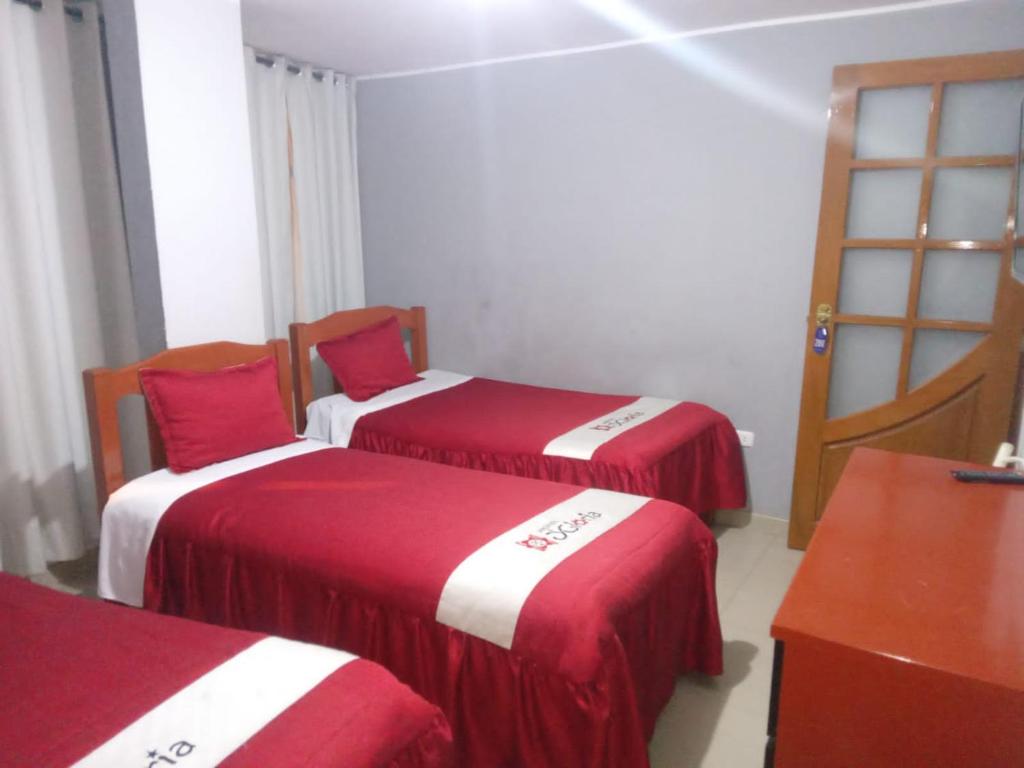 Postel nebo postele na pokoji v ubytování Hotel D'Gloria