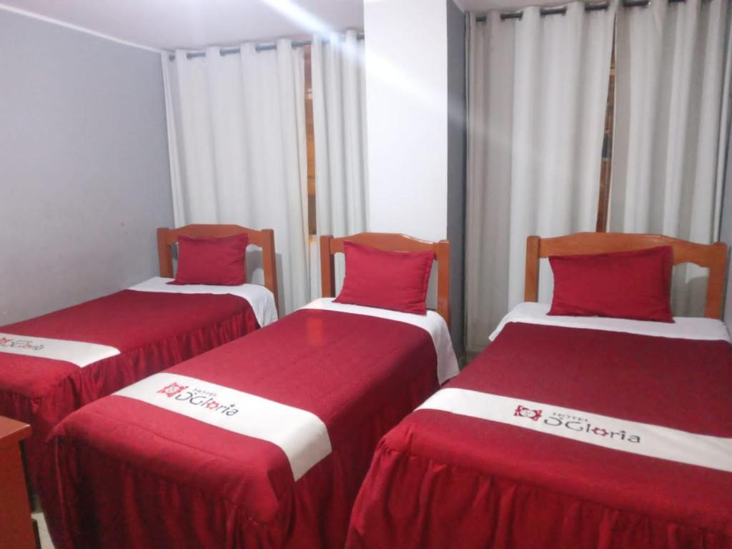 Postel nebo postele na pokoji v ubytování Hotel D'Gloria