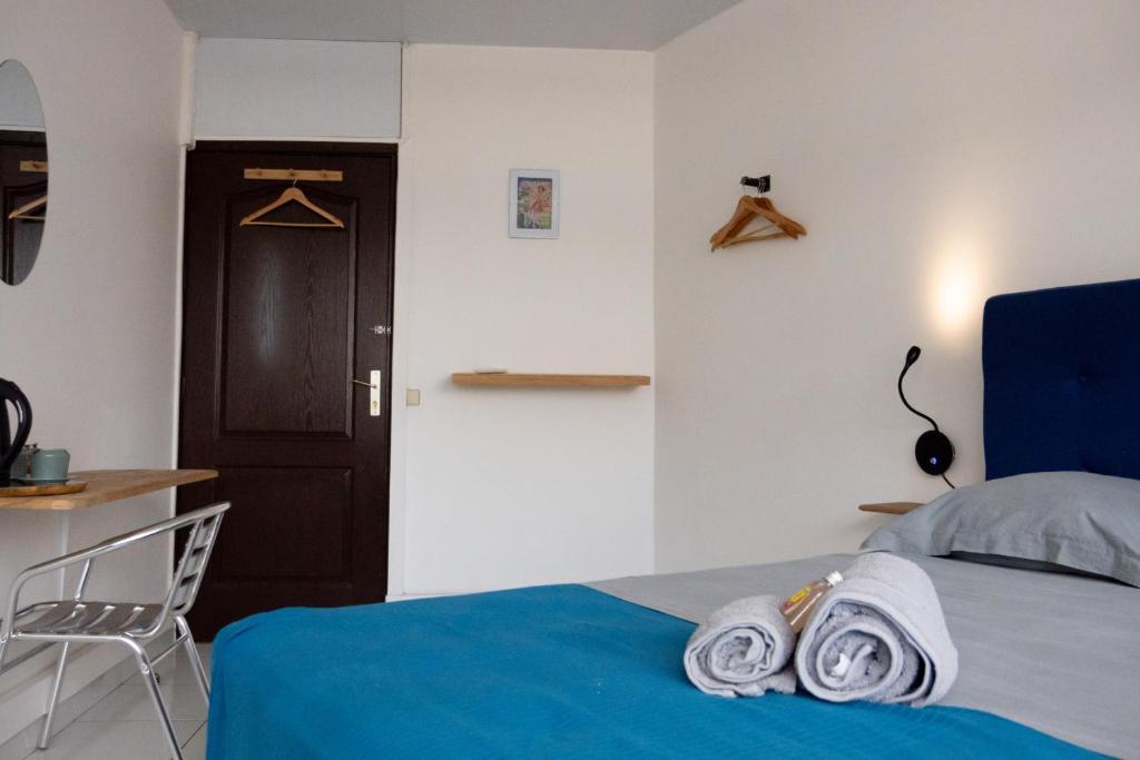 Una cama o camas en una habitación de Dreamliner room city center