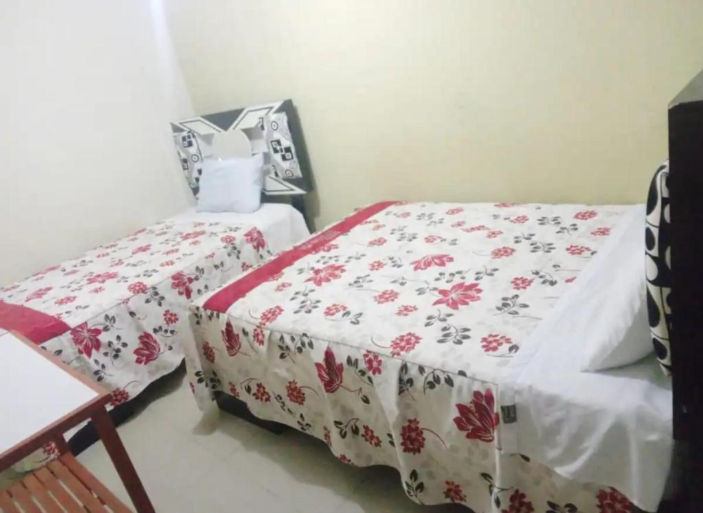Postel nebo postele na pokoji v ubytování Hotel D'Gloria