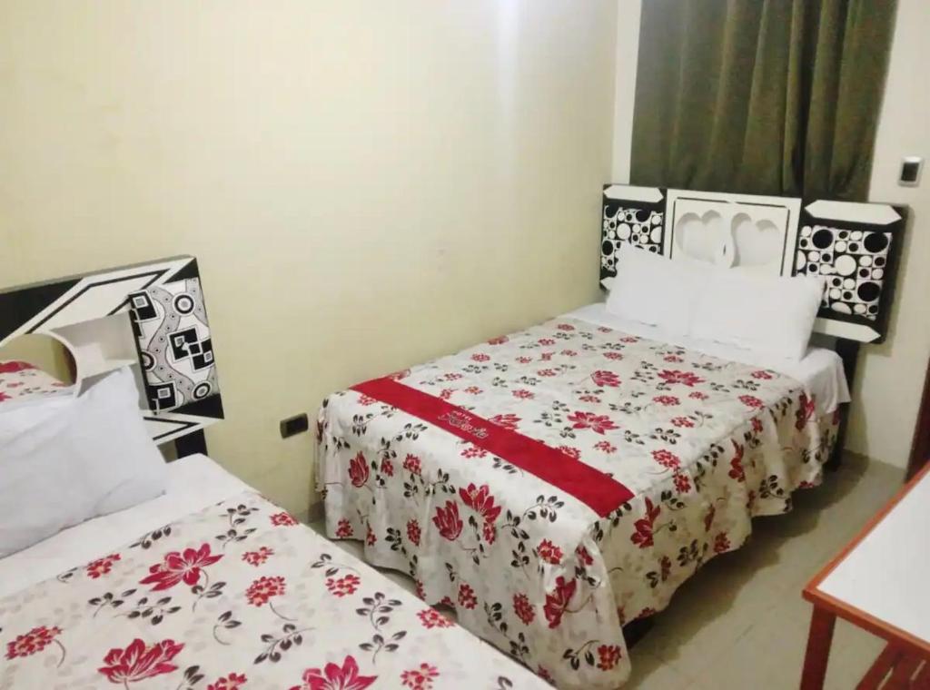 Postel nebo postele na pokoji v ubytování Hotel D'Gloria