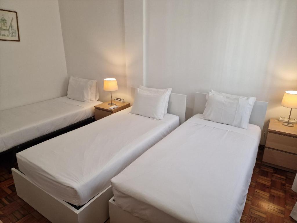 Postel nebo postele na pokoji v ubytování Funchal Downtown Flats 2