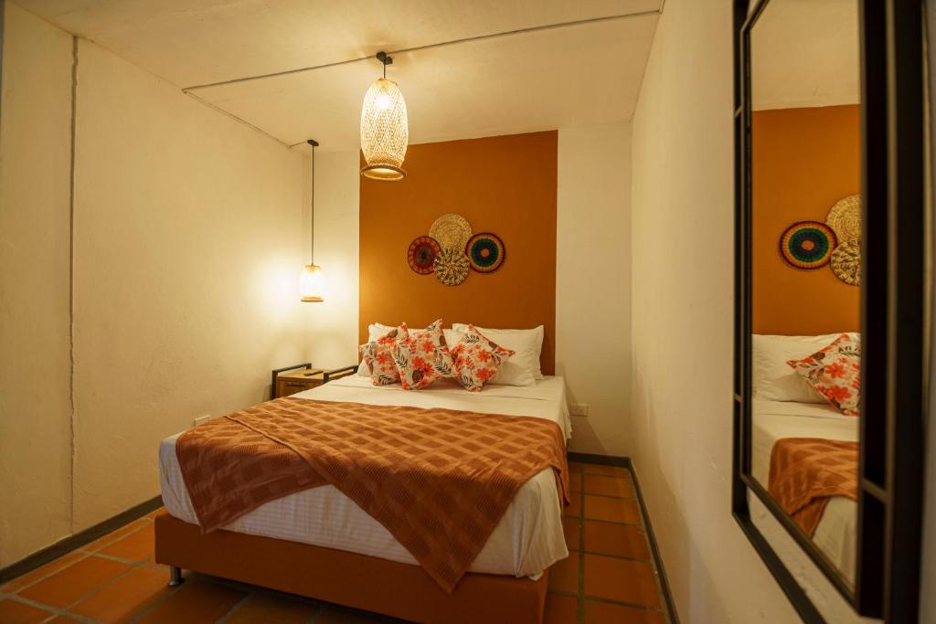 Postel nebo postele na pokoji v ubytování Tres Lagos Hotel