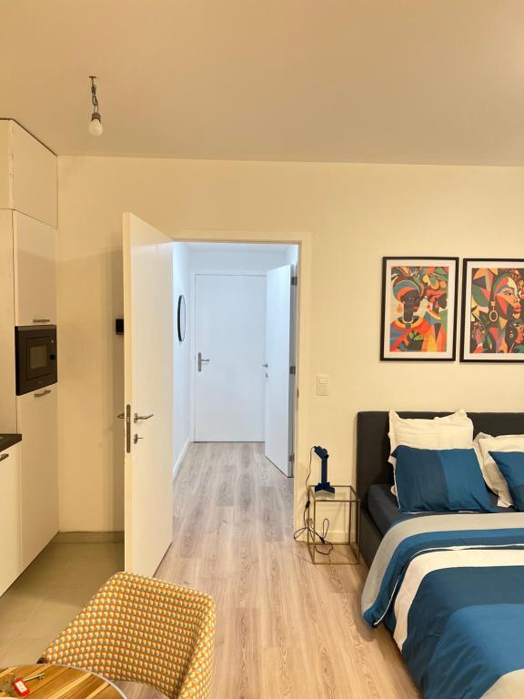 En eller flere senge i et værelse på Love-room-brussels