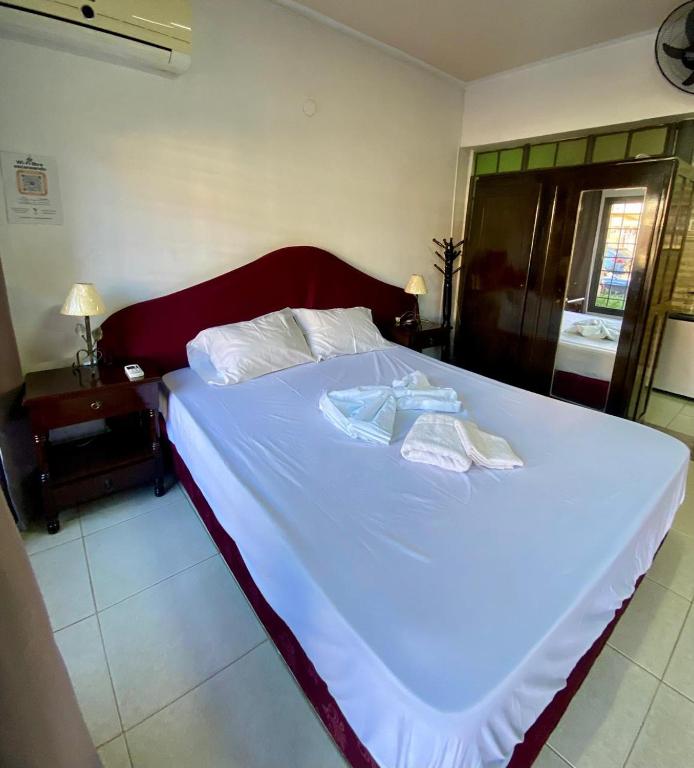 Postel nebo postele na pokoji v ubytování Mangoty Apartamento