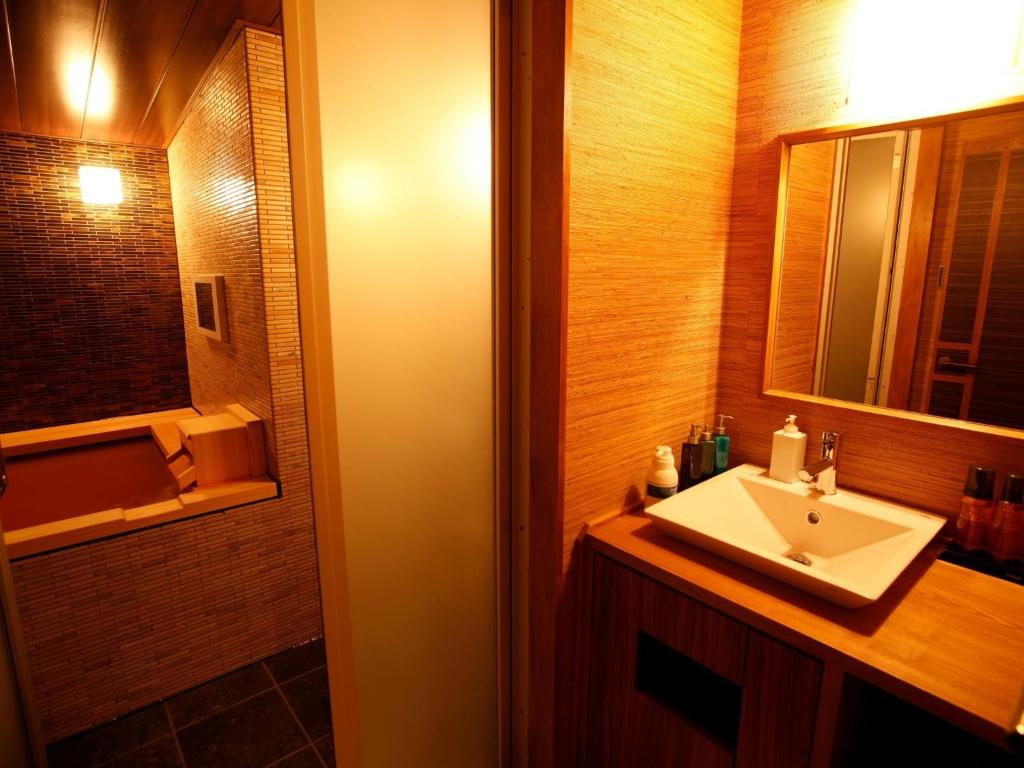 Koupelna v ubytování Arima Hot Spring Ryokan Hanamusubi