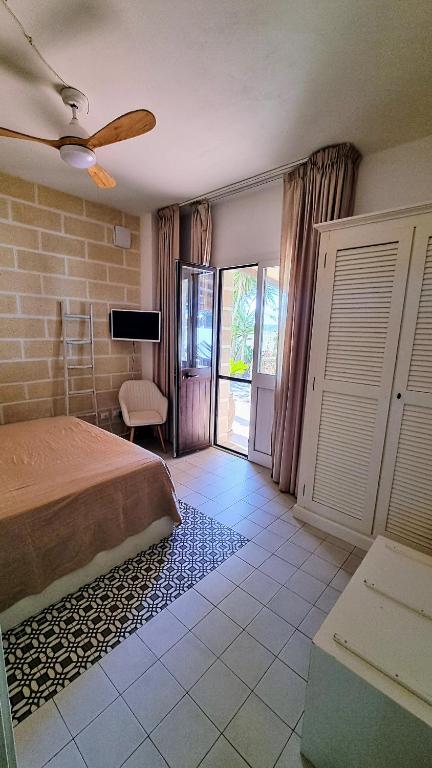 Postel nebo postele na pokoji v ubytování Casa Armonia