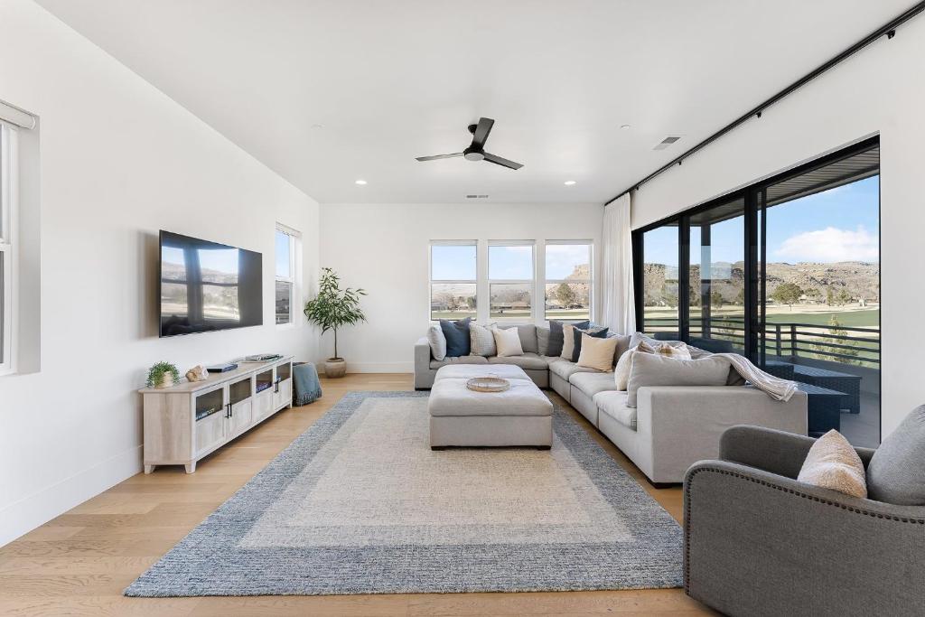 a living room with a couch and a table at Villa #22 at Bloomington Country Club - Fairway to Heaven condo in St. George