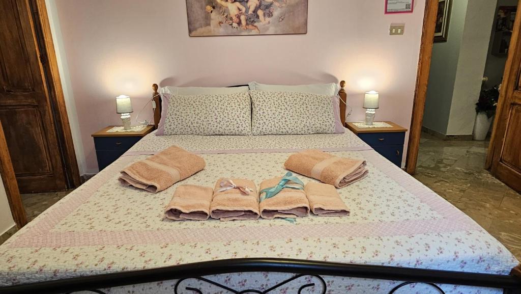 Postel nebo postele na pokoji v ubytování B&B Le 4 Stagioni sul viale, belvedere di Agrigento