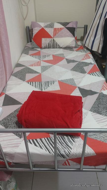 Postel nebo postele na pokoji v ubytování Muscat Galaxy Hostel