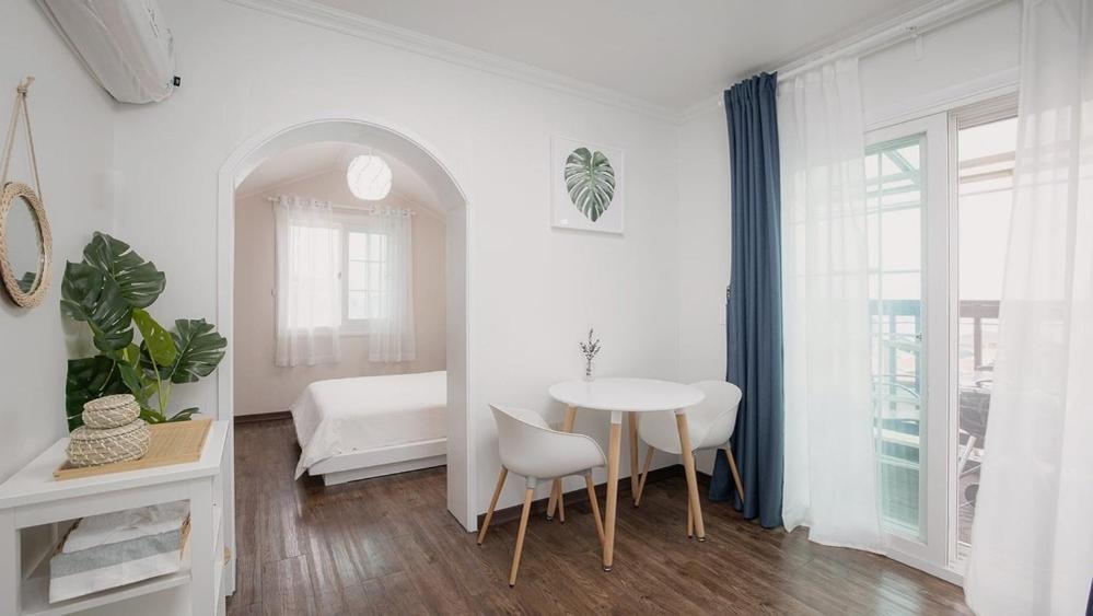 Postel nebo postele na pokoji v ubytování My Sea Pension