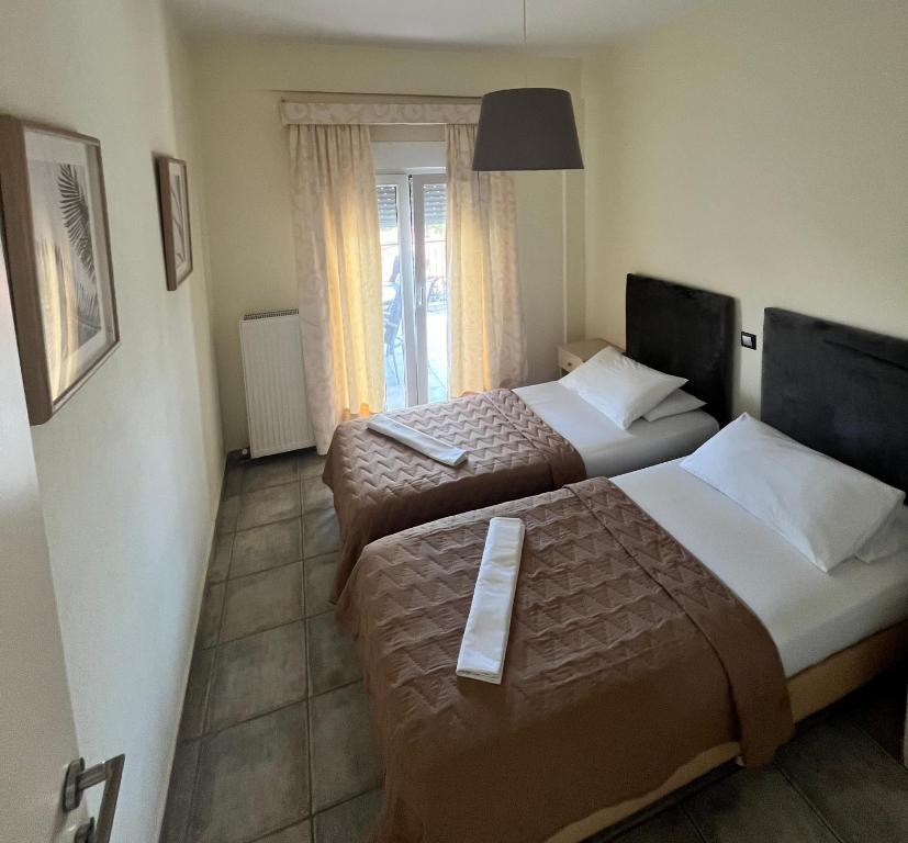 Posteľ alebo postele v izbe v ubytovaní DERES Apartments