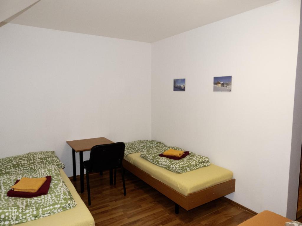 Postel nebo postele na pokoji v ubytování Penzion Čekanka