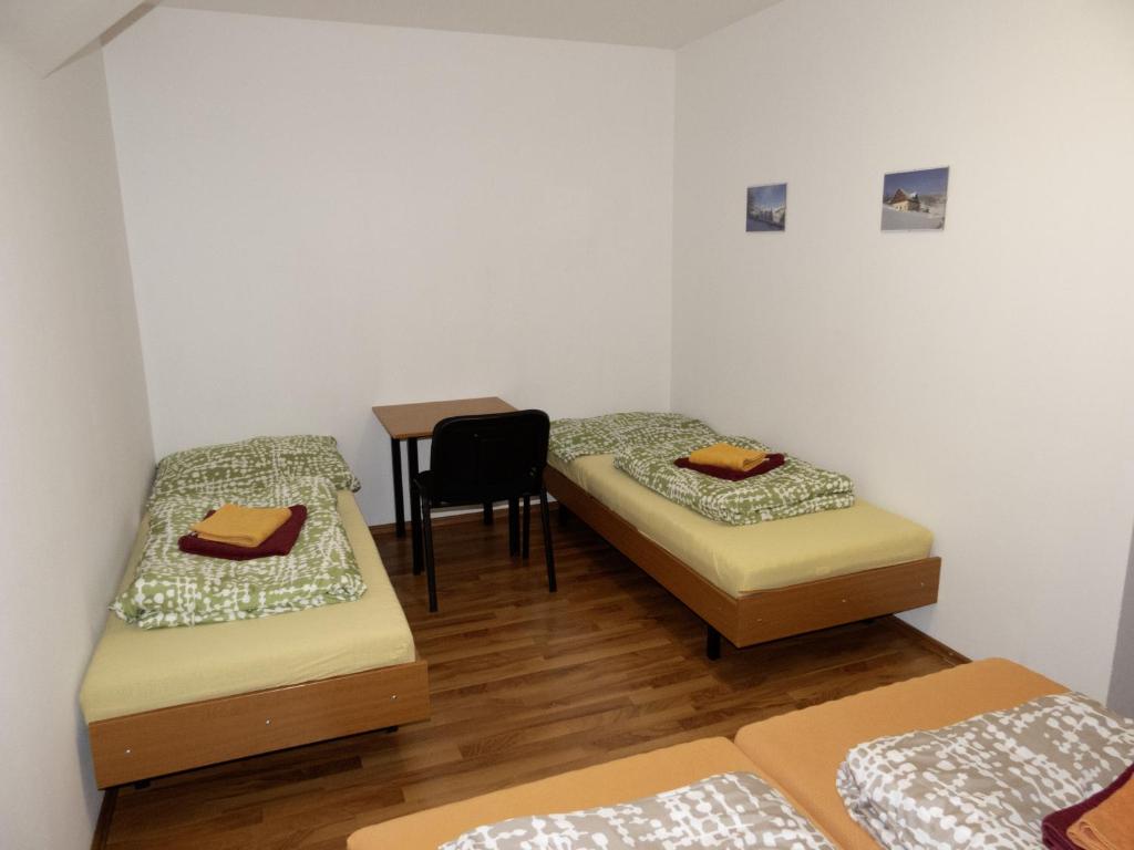 Postel nebo postele na pokoji v ubytování Penzion Čekanka