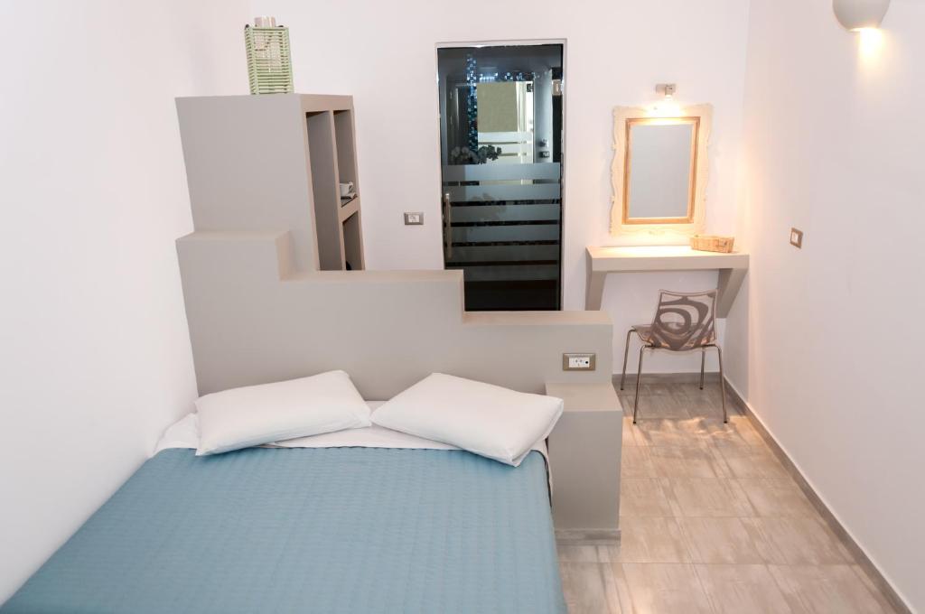 A bed or beds in a room at Caldera's Majesty