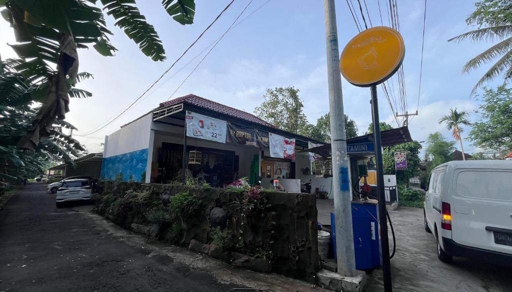 a gas station on the side of a street at Maisaba Living Sibang Gede in Bringkit