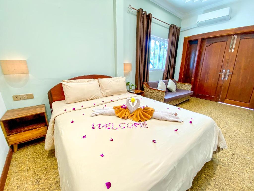 Postel nebo postele na pokoji v ubytování Muni Residence & Spa