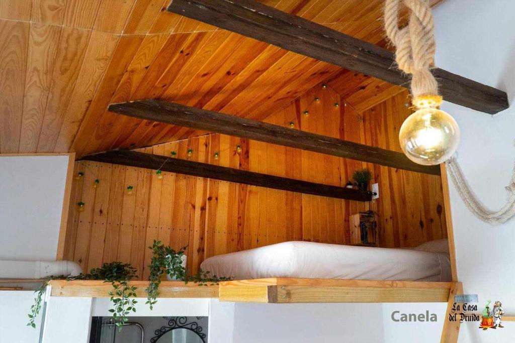 Posteľ alebo postele v izbe v ubytovaní La Casa del Druida