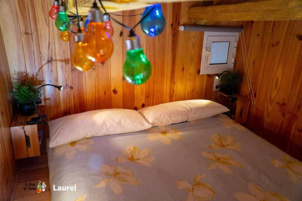 Posteľ alebo postele v izbe v ubytovaní La Casa del Druida