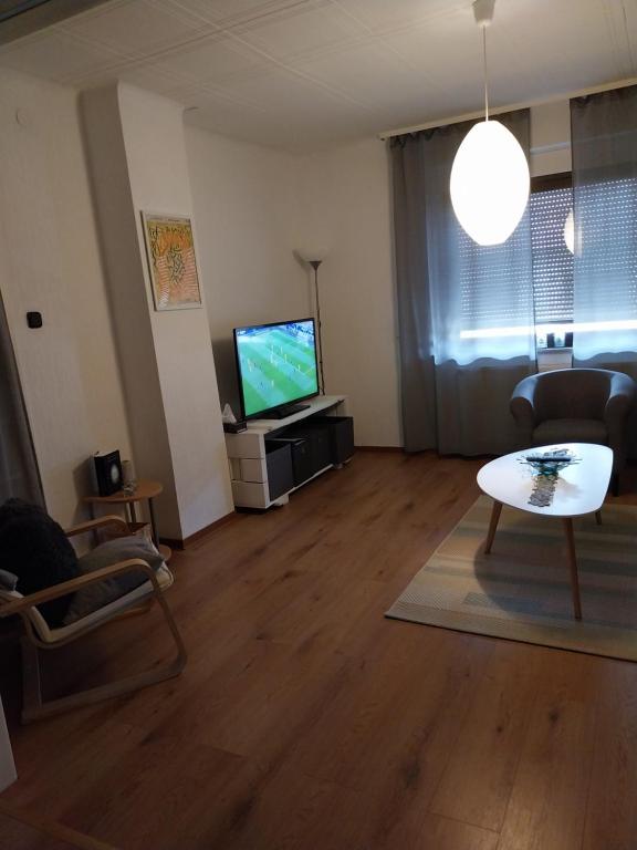 TV a/nebo společenská místnost v ubytování Ferienwohnung Manta