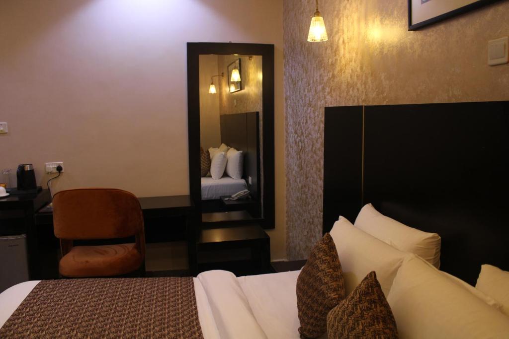 Postel nebo postele na pokoji v ubytování Residency Hotel Lekki Phase 1