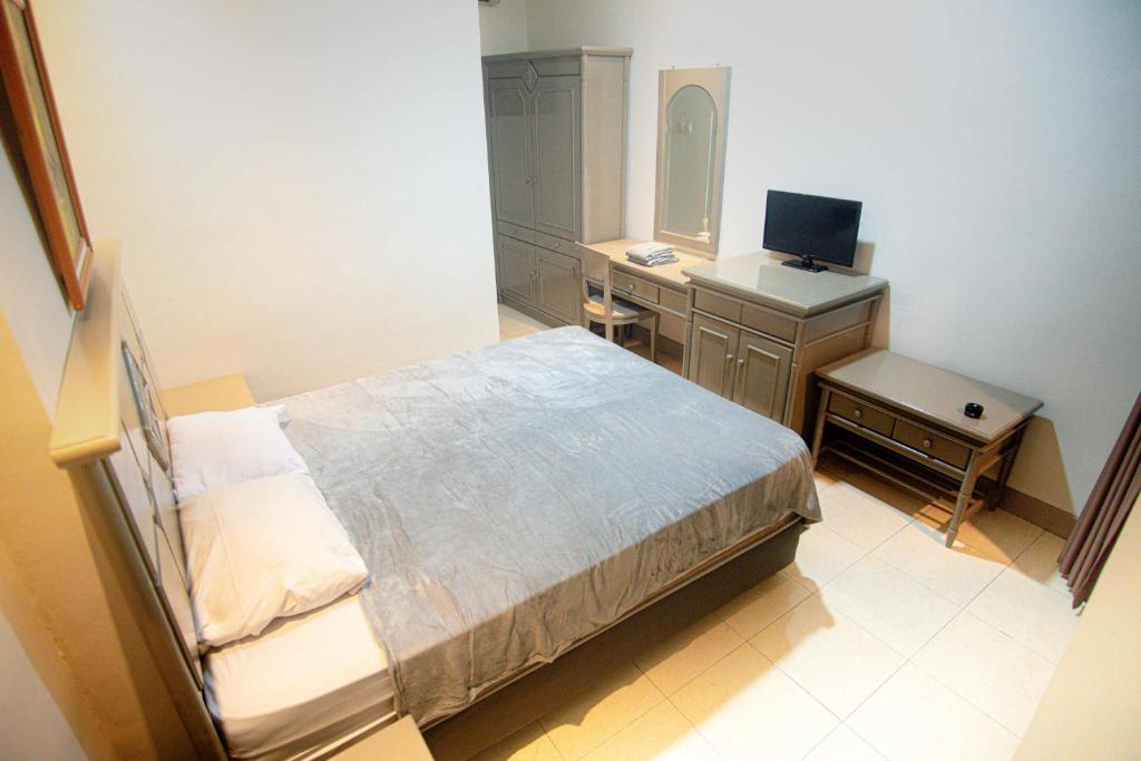 Letto o letti in una camera di Hotel Permata Malioboro