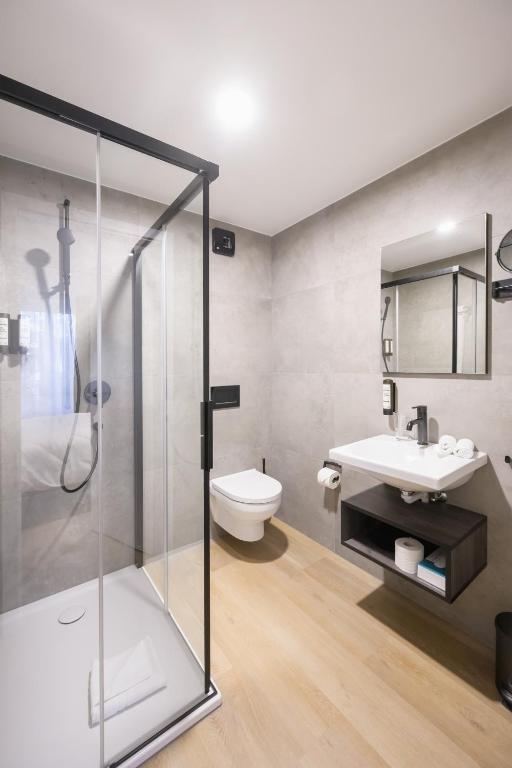 Koupelna v ubytování Hôtel Arnold self check-in