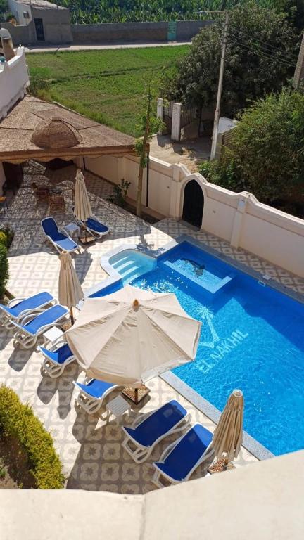 Bazén v ubytování El Nakhil Hotel nebo v jeho okolí