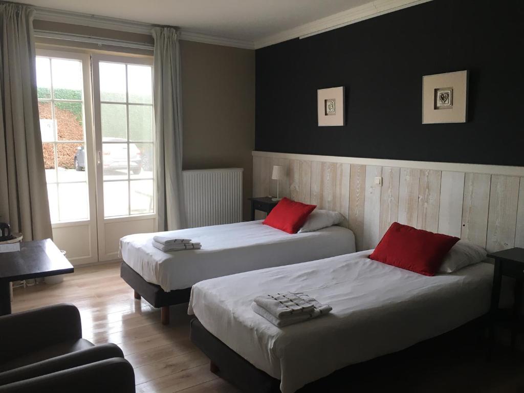 Voodi või voodid majutusasutuse B&B Castellier toas