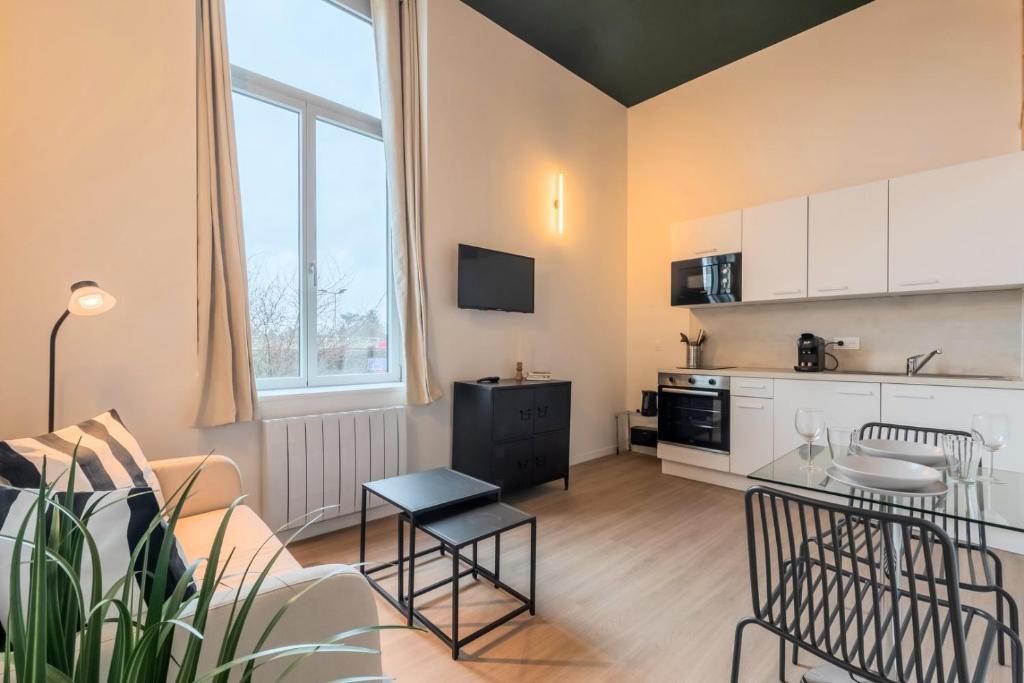 Η κουζίνα ή μικρή κουζίνα στο Studio équipé pour une personne