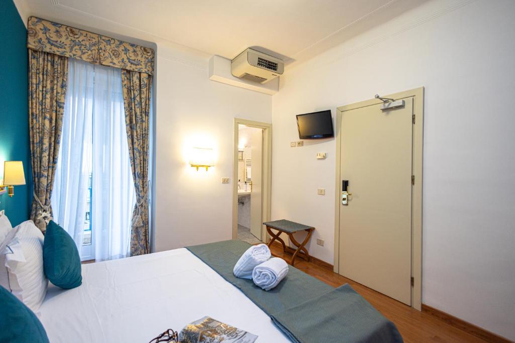 Posteľ alebo postele v izbe v ubytovaní Hotel Majestic by LVG Hotel Collection