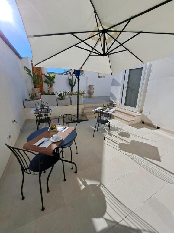 Patio nebo venkovní prostory v ubytování Le Dune Luxury Rooms