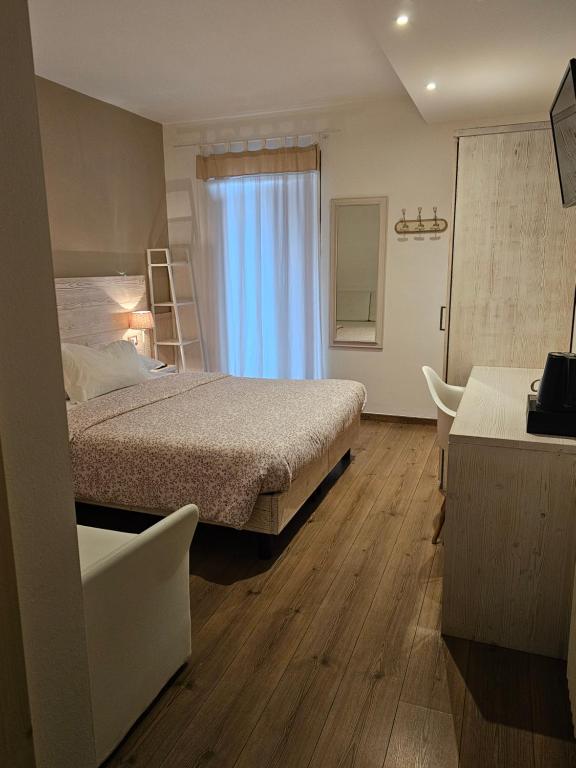 Postel nebo postele na pokoji v ubytování Garni San Lorenzo
