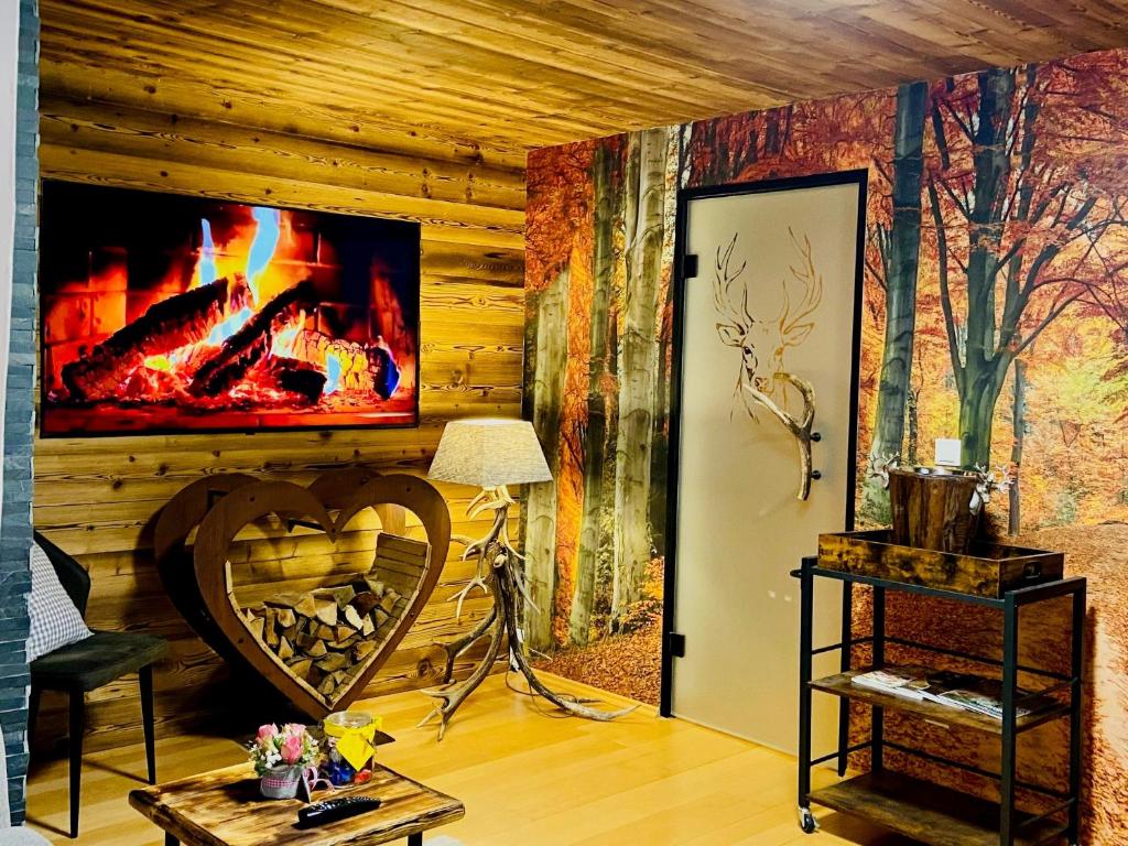 TV a/nebo společenská místnost v ubytování Wilderer Suiten Mariazell