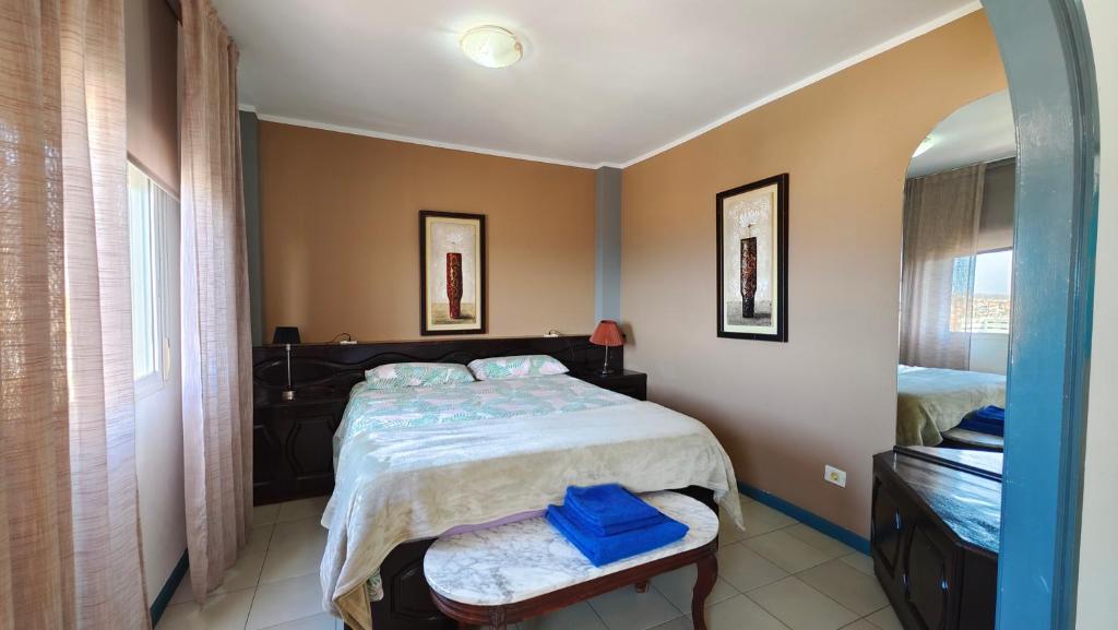 A bed or beds in a room at Apartamento Palmeras Del Sur