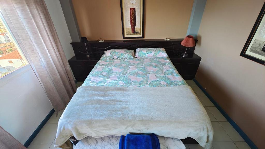 A bed or beds in a room at Apartamento Palmeras Del Sur