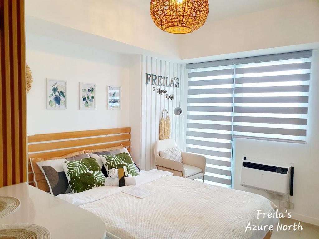 Ένα ή περισσότερα κρεβάτια σε δωμάτιο στο Freila's Azure North