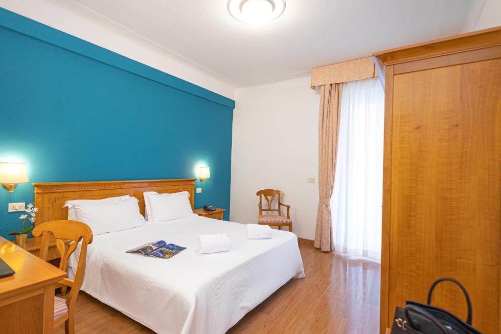 Posteľ alebo postele v izbe v ubytovaní Hotel Majestic by LVG Hotel Collection